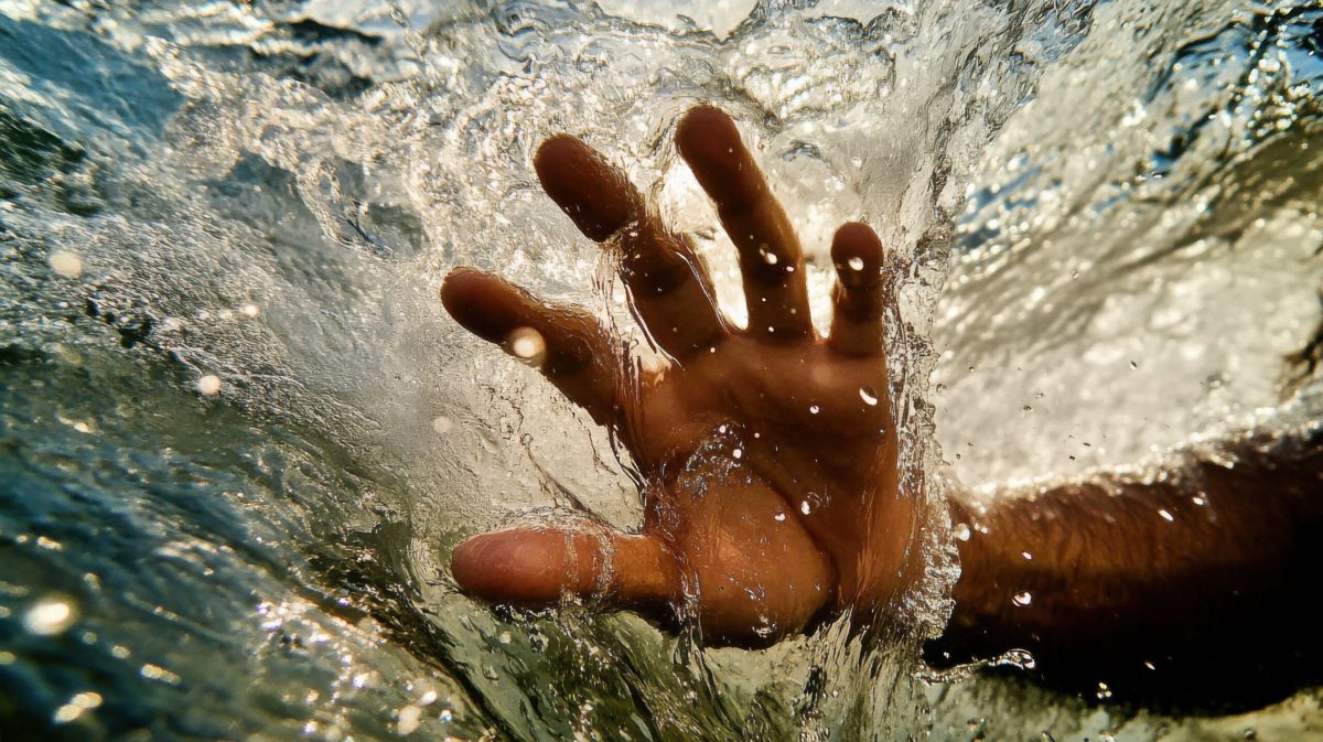Vecteezy a person s hand is in the water and is being splashed 71014307 1 scaled.jpeg