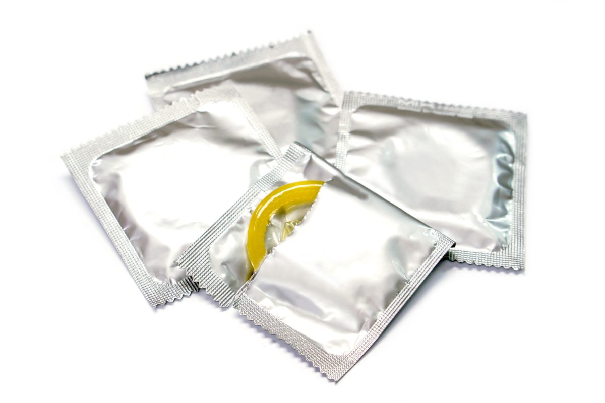 Vecteezy condom in seal package and opened isolate on white background 9375512 scaled.jpg