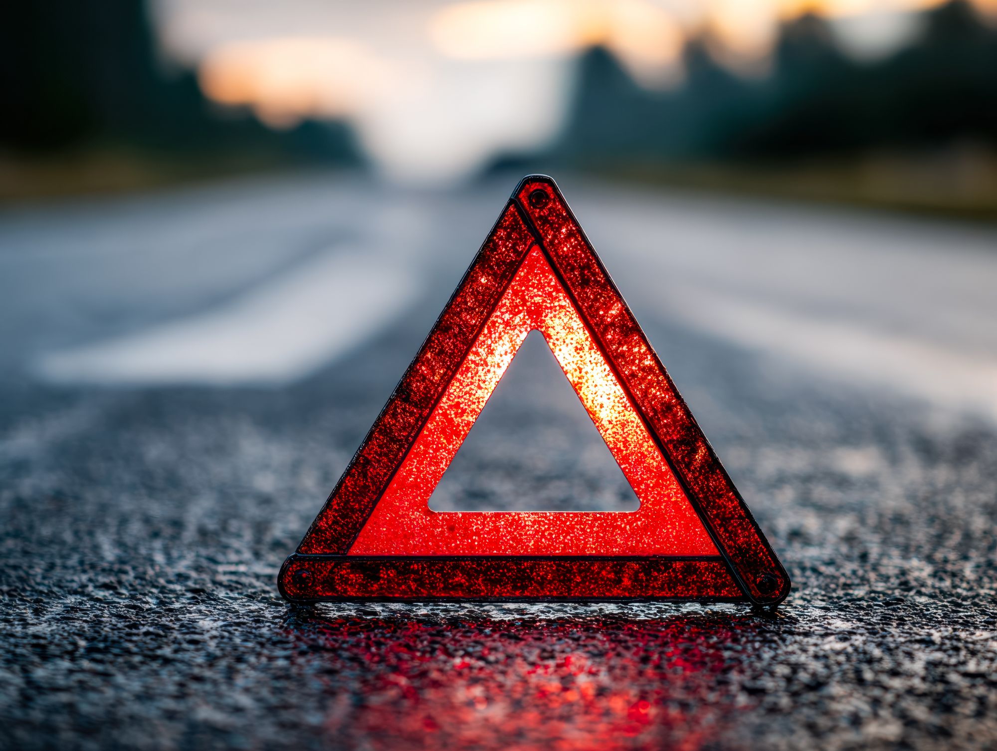 Vecteezy reflective warning triangle on a road during sunset 724524287418926957842106566.jpg