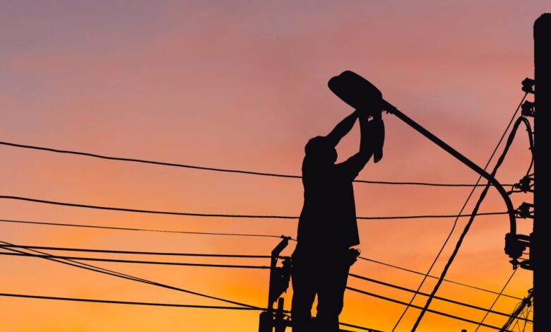 Vecteezy silhouette of electrician checking lighting to the led 6882879 scaled.jpg