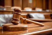 Vecteezy wooden gavel on courthouse desk symbol of justice law and 70701515 1 1 1 scaled.jpeg