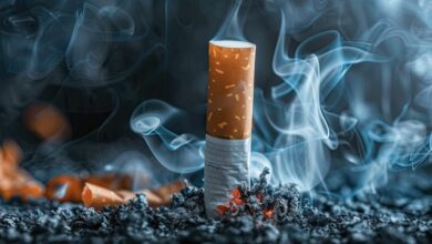 Vecteezy burning cigarette standing upright on ash with smoke on dark 45689048 scaled.jpg