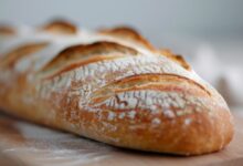 Vecteezy freshly baked artisan bread on a wooden cutting board in a 49087455 scaled.jpeg